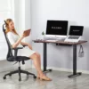brown electric height adjustable desk